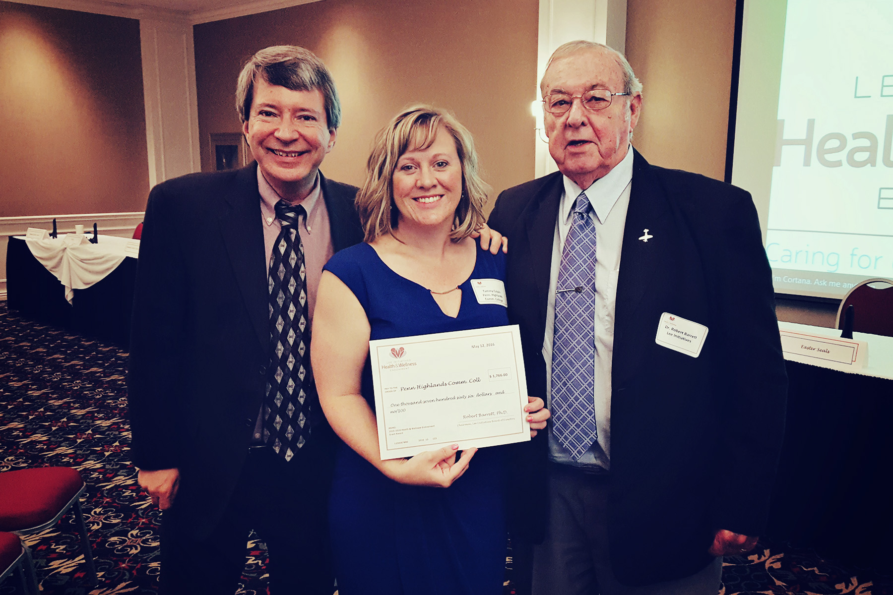 Photo includes (left to right): Rick Bukoski, Instructor of Communication and Media Studies; Tammy Calpin, Instructor of Medical Assisting and Practicum Coordinator; and Dr. Robert Barrett, Chairman of Lee Initiatives. The photo was taken during the Lee Initiatives Grant Awards Ceremony. 