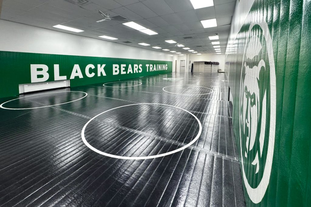 Image of the Black Bears Training Facility. Shows both the floor and side mats.