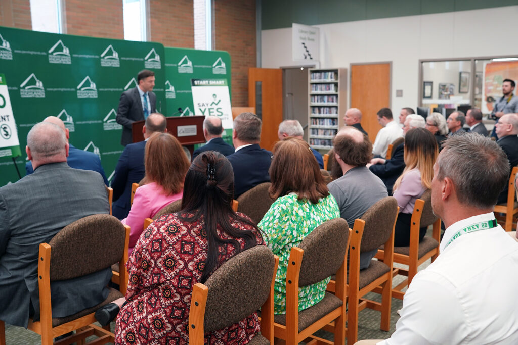 Attendees watching the Smart Start press conference.