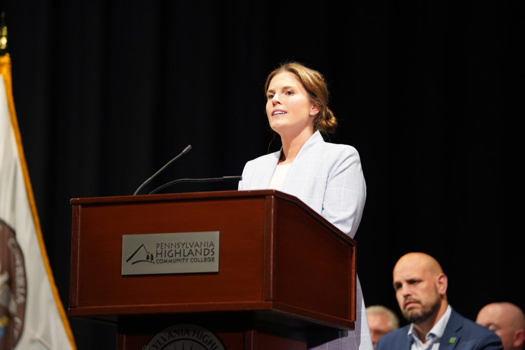 Speaker talking at graduation ceremony.