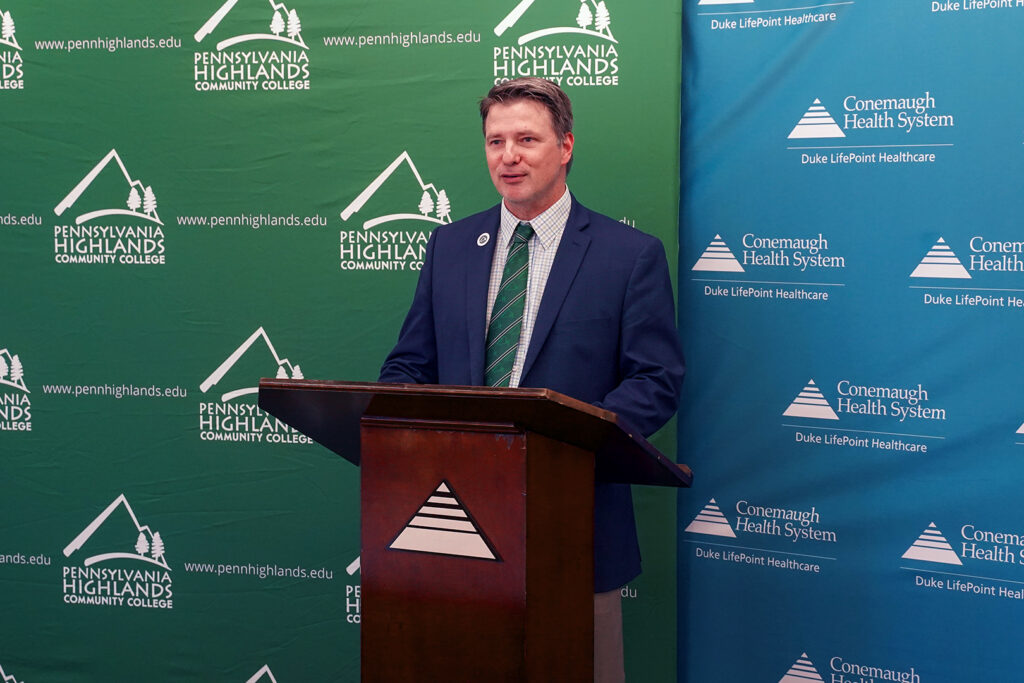 Dr. Steve Nunez speaking at the signing of the Surgical Technology partnership documentation.